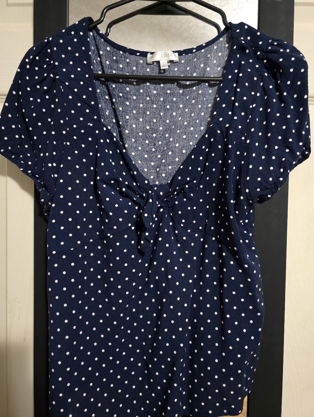 Junior’s Navy Polka Dot Tie-Front Top